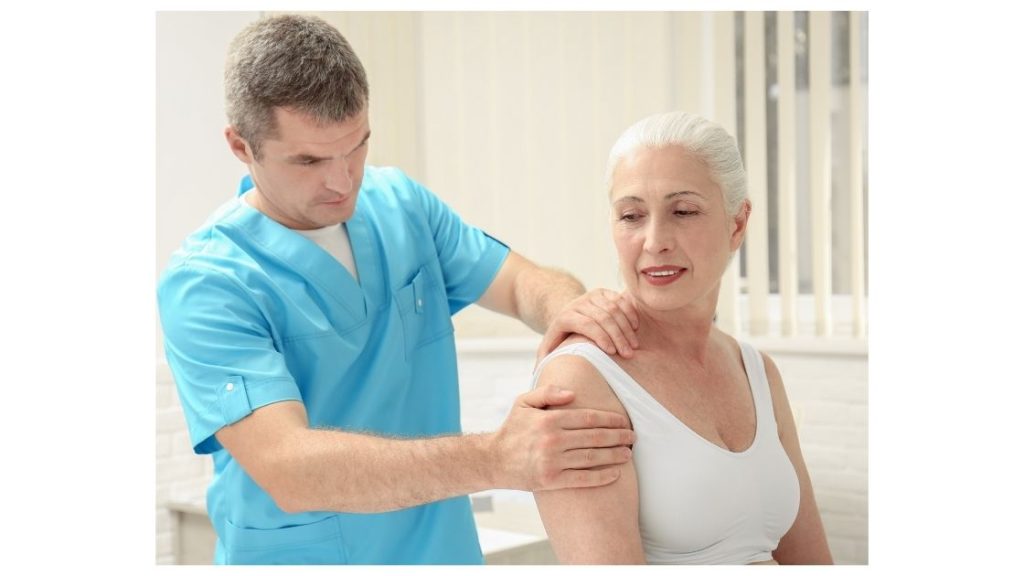 An elderly lady getting massage