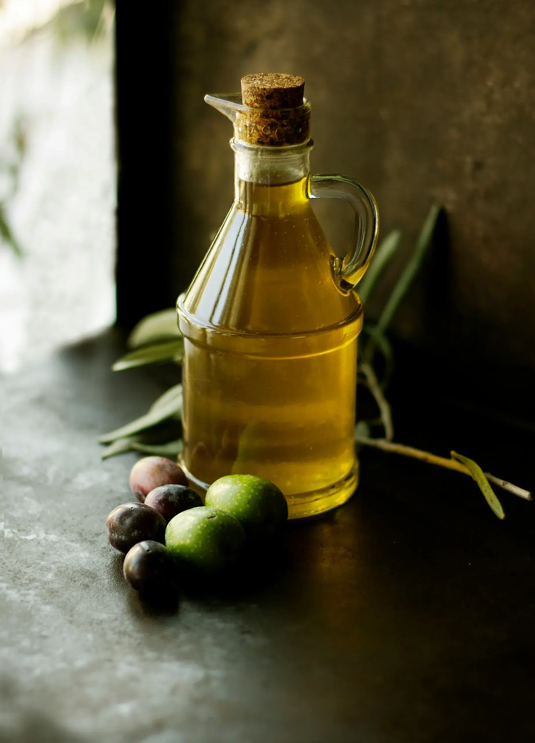 A bottle containing olive oil